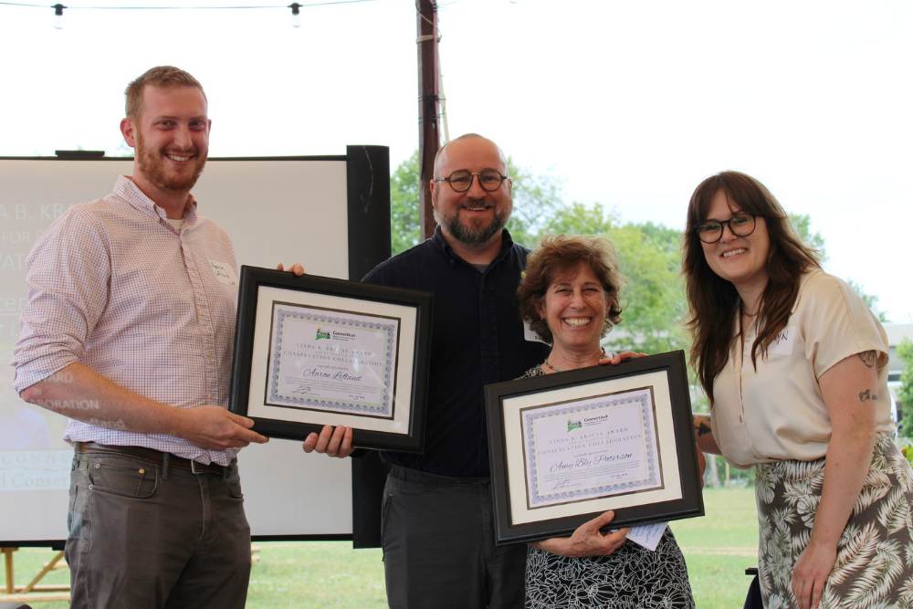 Two CLCC staff accept award from 2 CT RC&D representatives