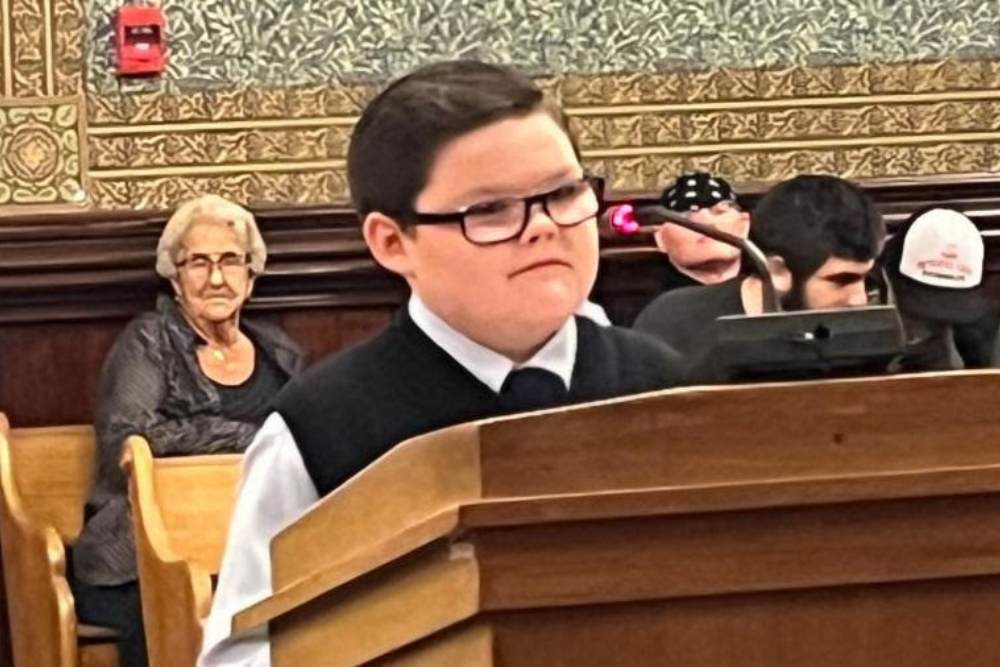 Child testifying at a hearing at the Capitol
