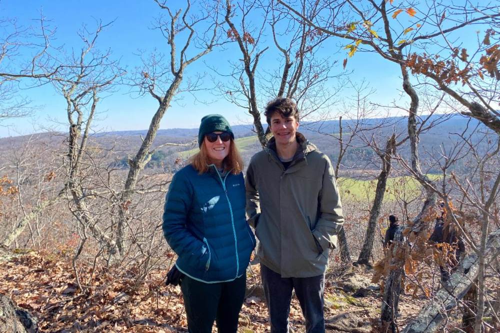 Two young conservationists posing at a hike in November