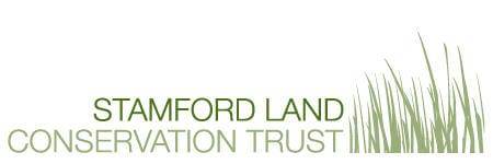 Green grass with Stamford Land Conservation Trust text